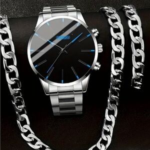 Geneva BlackQuartz Watch with silver bracelet and chain.